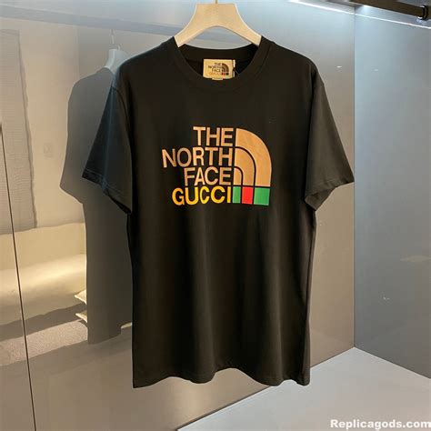 t-shirt north face gucci